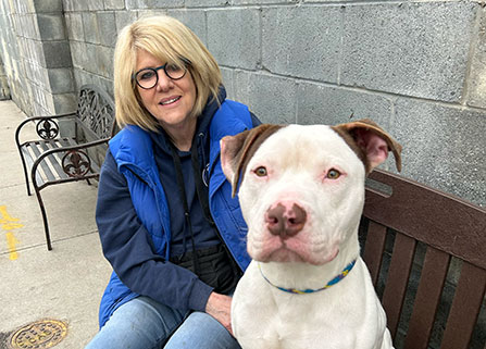 Photo of a woman and a dog. Link to What to Give. Photo of a woman and a dog. Link to What to Give.